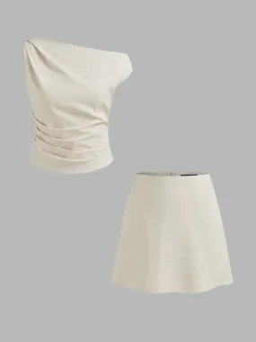 Top de tirantes asimétrico de mezcla de algodón con frunces y falda mini de talle alto lisa